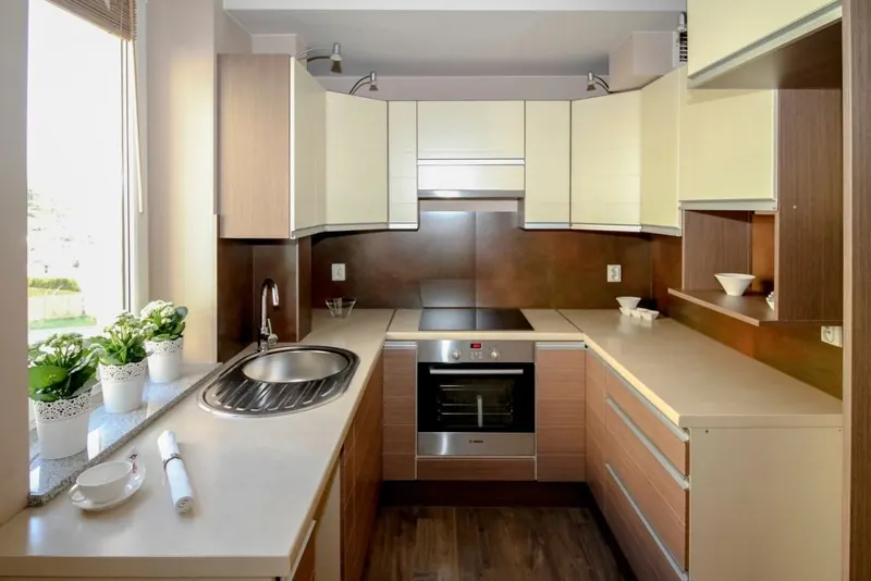 Kitchen and bathroom fitter at work